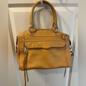 Rebecca Minkoff satchel.  Extra leather tassels and crossbody strap included.